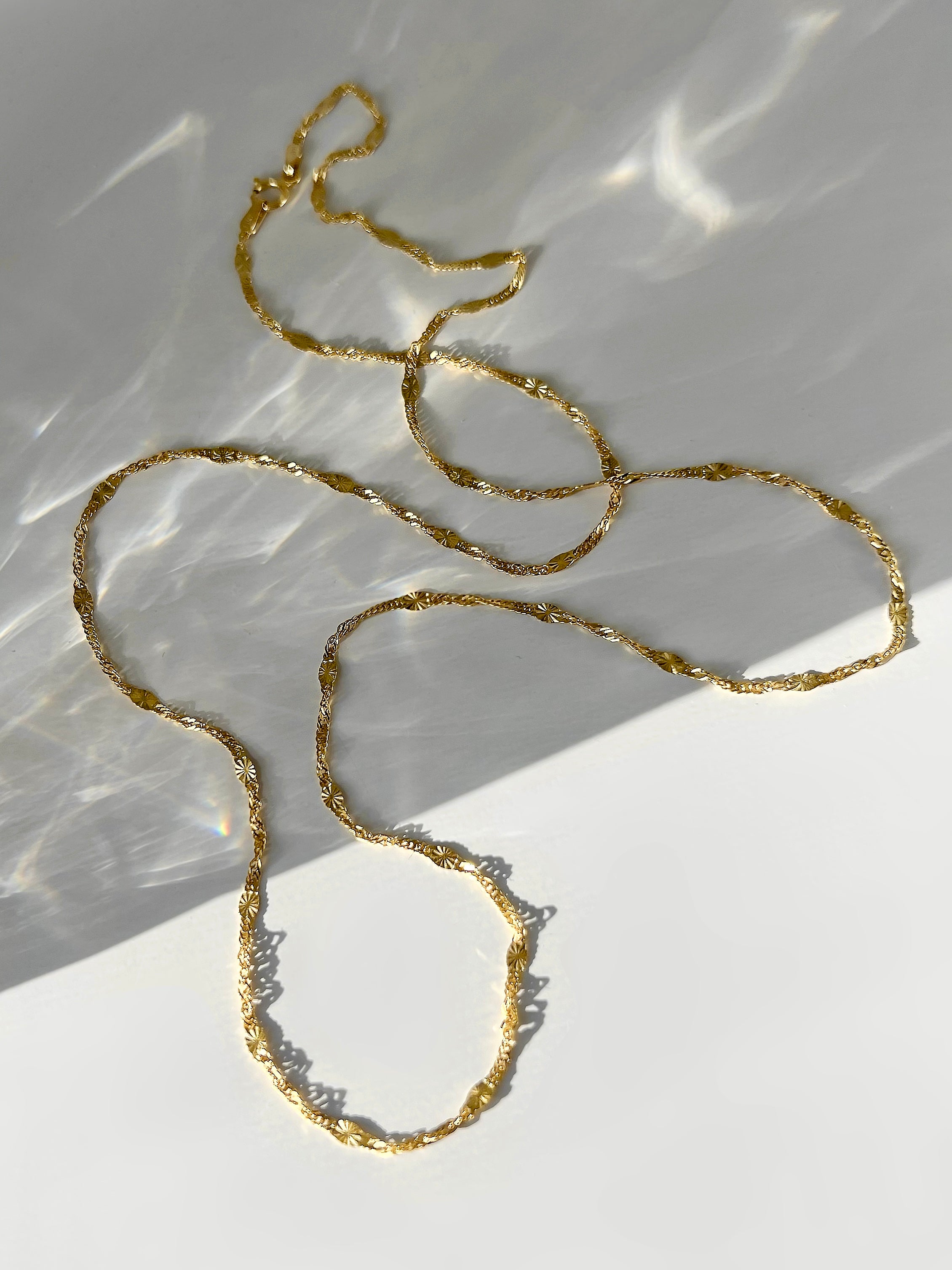 14K gold sunburst singapore chain