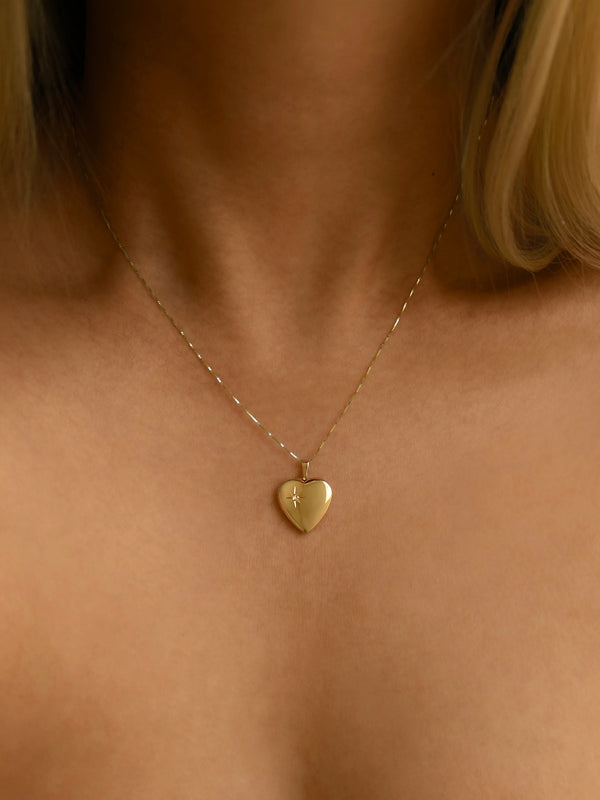 THE HEART OF GOLD LOCKET NECKLACE