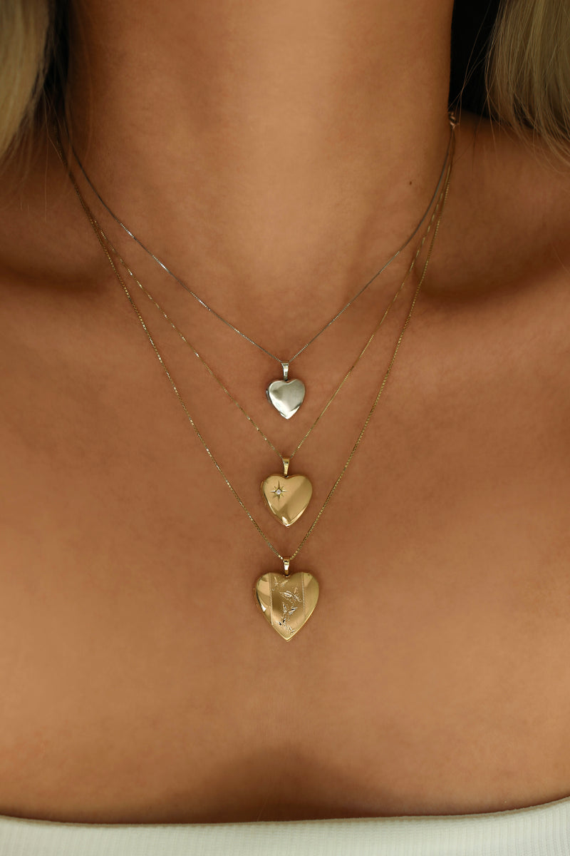 THE HEART OF GOLD LOCKET NECKLACE